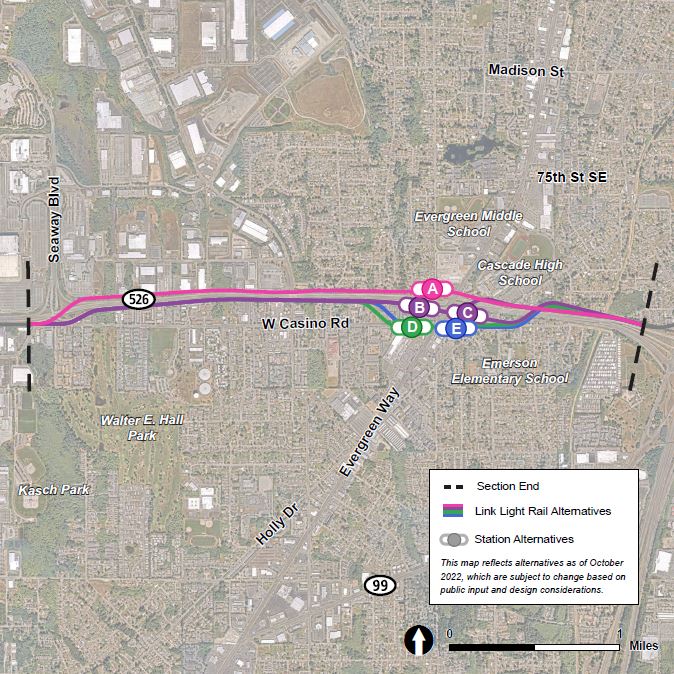 This map reflects the SR 526 / Evergreen route and station alternatives as of October 2022, which are subject to change based on public input and design considerations. The station area is shown in a zoomed-out view that illustrates the potential routes stretching from Southwest Everett Industrial Center to interstate five. Map shows the SR 526 / Evergreen station area, located at the intersection of the two roads. The five station alternatives shown near the area are labeled A, B, C, D and E. The four route alternatives shown are colored pink, purple, green and blue. The pink route shows the representative project, which runs along the north side of SR 526, intersecting station location A just west of Evergreen Way. The purple route runs along the south side of SR 526, intersecting station location B just west of Evergreen Way, and station C just east of Evergreen Way. The blue route follows the same route as the purple route on the south side of SR 526 before splitting off south to run along West Casino Road near the intersection of Evergreen Way before heading back to the south side of SR 526. The green route is very similar to the blue route in that it runs along the south side of SR 526 before turning south near the intersection of West Casino Road and Evergreen Way temporarily before turning back towards SR 526. 